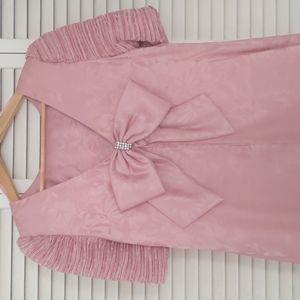 Pink dress with large bow